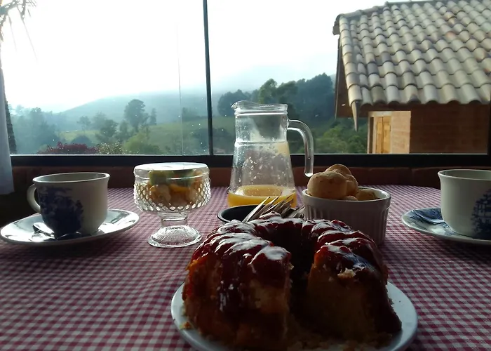 Chalé Sol e Brisa com banheira de imersão e vista para montanhas